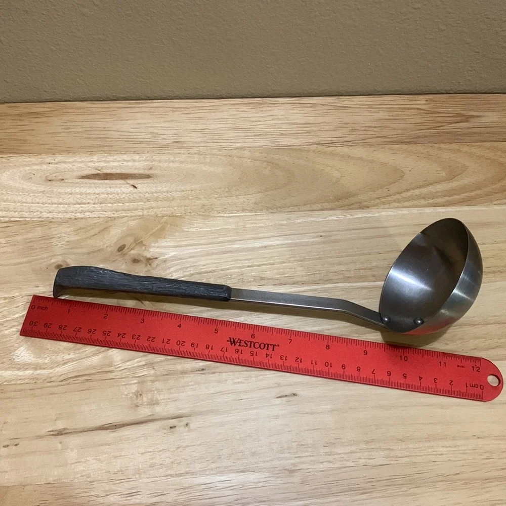 Stainless Steel vintage Ladle with cool sculpted handle